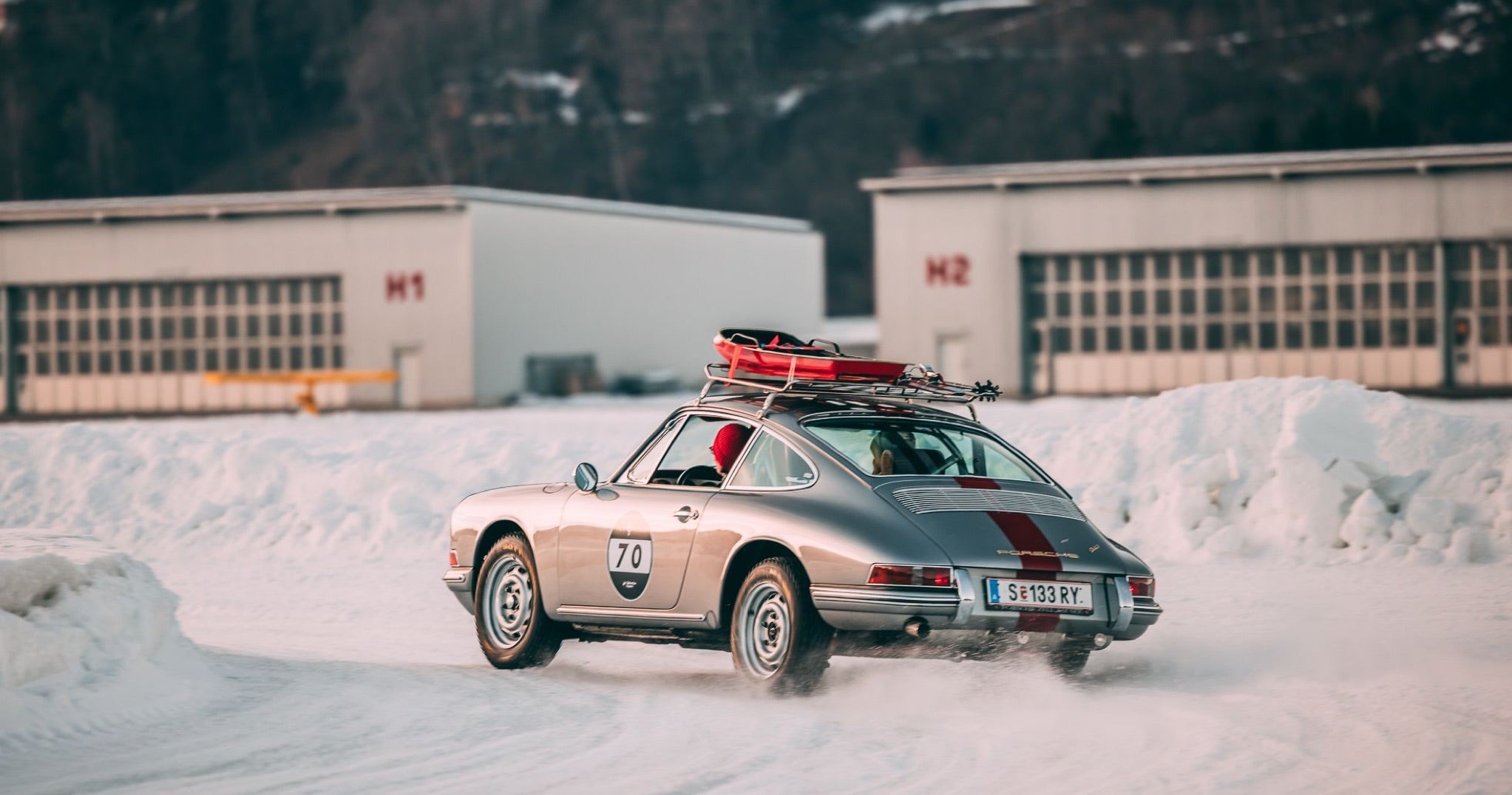 <span>Ferdi&rsquo;s cousin Mark Porsche races Porsche&rsquo;s 911S at the 2022 GP Ice Race</span> <br/><span class="caption-sub"><em>Photo credit: Stephan Bauer </em></span><br/>